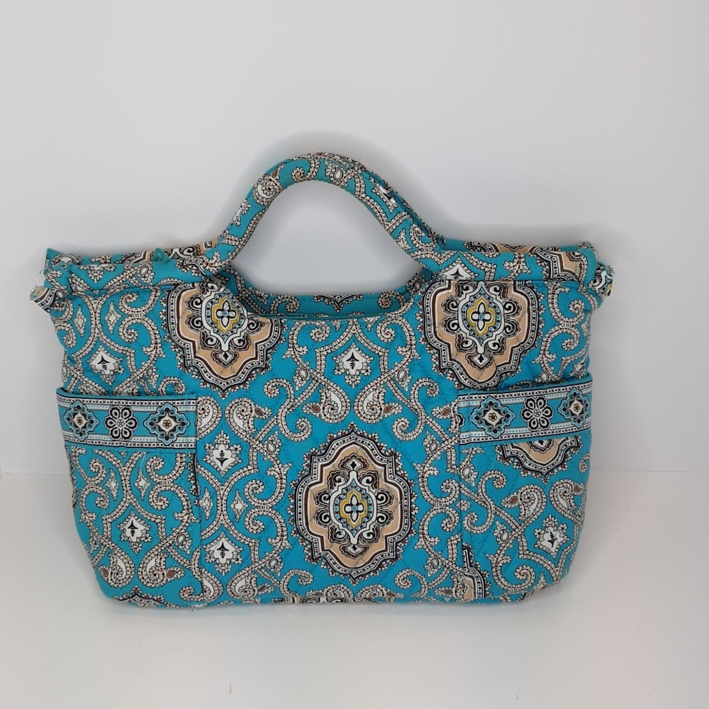 Vera Bradley turquoise and tan print wrist…